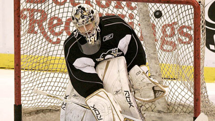 Penguins' goalie Marc-Andre Fleury has multiple pucks shot at him at practice Sunday at Joe Louis Arena in Detroit.