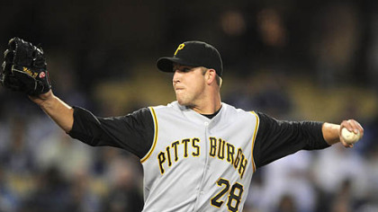 Starting pitcher Paul Maholm throws to the plate during the second inning of last night's baseball game against the Los Angeles Dodgers in Los Angeles.