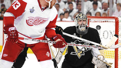 Penguins goalie Marc-Andre Fleury makes a save on a shot by the Red Wings' Johan Franzen in the second period.