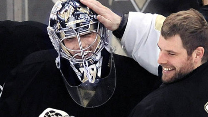 Backup goalie Ty Conklin congratulates Marc-Andre Fleury after yesterday's 2-0 shutout victory against the Rangers at Mellon Arena. Fleury made 26 saves to improve to 6-0 in the playoffs.