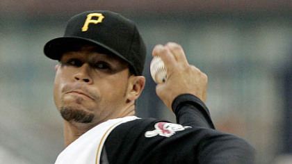 Pirates starter Ian Snell pitches against the Reds in the first inning.