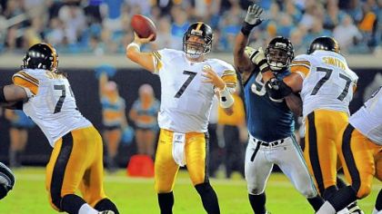 Darnell Stapleton, left, drew high marks for his first start Sunday night against Jacksonville.