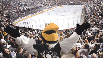 Iceburgh dances for the crowd as Penguins fans fill Mellon Arena to watch the first game of the Stanley Cup final Saturday.