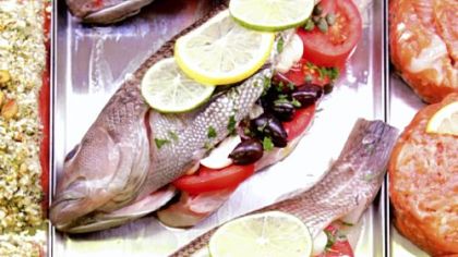 Mediterranean whole, stuffed black bass in the fresh seafood section at the Cleveland Whole Foods store.