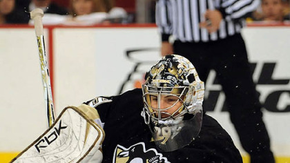 Penguins Marc-Andre Fleury makes save against the Flyers in the second period.