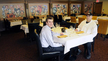 John Vlasic, left, manager, and Joseph Zawacki, kitchen manager, get to the meat of the matter at Pittsburgh Chop House in Robinson.