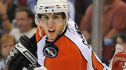 A shot from the Flyers' Simon Gagne flutters above the head of goalie Marc-Andre Fleury last night.
