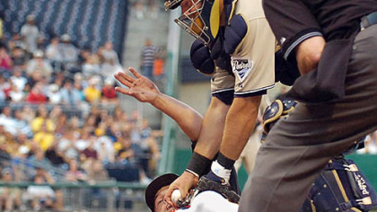 Padres catcher Josh Bard tags out Freddy Sanchez in the third inning last night at PNC Park.