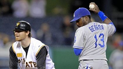 Ryan Doumit argues that he was safe at second after being tagged out by the Dodgers' Angel Berroa in the fourth inning last night.