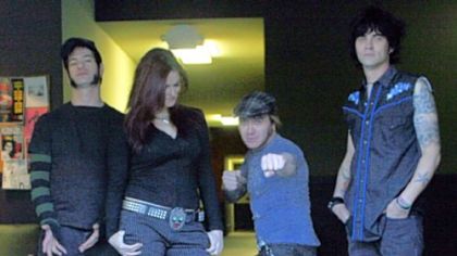 Lita, aka Amy Dumas, second from left, now wrestles with punk with The Luchagors.