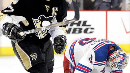 Penguins Sidney Crosby celebrates after Hossa scored in the overtime beating the Rangers.