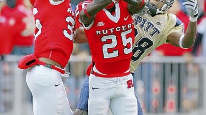 Rutgers defensive backs Courtney Greene, left, and Jason McCourty break up a pass intended for Pitt's Oderick Turner Oct. 17, 2007. Rutgers defeated Pitt, 20-16.
