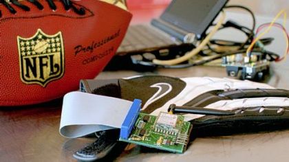Students at Carnegie Mellon are developing technology to enhance football officiating using GPS systems in footballs and pressure sensors in gloves. The sensors would give more exact readings than the traditional visual techniques.