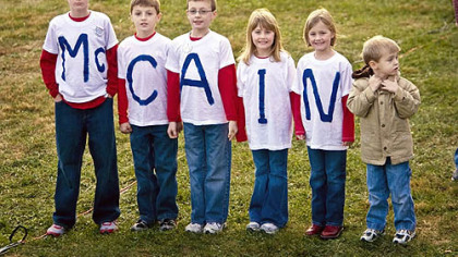 LANCASTER, OH. -- From left, Drew, Zach, Evan, Hannah, and Marisa Mahler of Breman, Ohio, line up at a rally for the Republican presidential candidate at the Ohio University Lancaster.