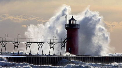 SOUTH HAVEN, Mich. -- Waves crash onto the pier and lighthouse Oct. 26.