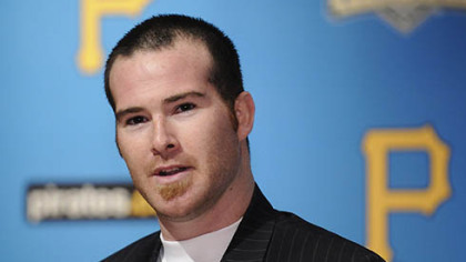Pirates catcher Ryan Doumit signed a three-year contract that includes a club option for an additional two years.