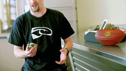 Benjamin Koopman, a sophomore computer engineering student at Carnegie Mellon, explains the technology behind the smart football project.
