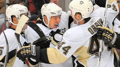 Ruslan Fedotenko, middle, celebrates his winner Tuesday.