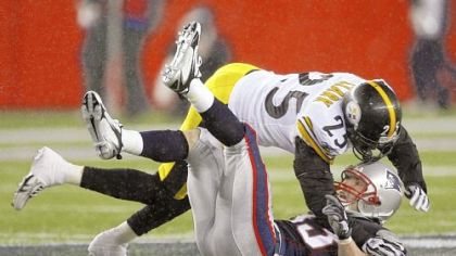 Ryan Clark follows Wes Welker to the ground after delivering his much-discussed hit Sunday.