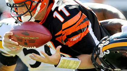 James Harrison sacks Bengals quarterback Ryan Fitzpatrick in the first half.
