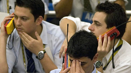 SAO PABLO, Brazil -- Traders work at Mercantile and Futures Exchange, Oct. 27. Latin American stocks declined in early trading, with Mexican equities tumbling hardest on concerns of a world recession.