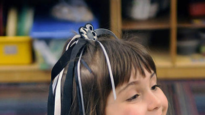 Madison Miller takes part in a kindergarten-level class at the school.