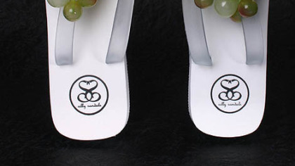 If wine tickles you down to your toes, how about wearing your heart on your feet with grape-topped flip-flops? $29.95 at sillysandals.com.