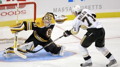 Bruins goalie Tim Thomas can't stop Evgeni Malkin from scoring the winning goal in the shootout last night in Boston.