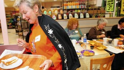 Lynn Kocon, a Franklin Regional adult education student, helps serves up the ultimate pumpkin pie at McGinnis Sisters in Monroeville.