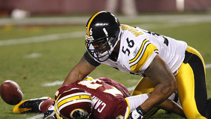 Redskins quarterback Jason Campbell is sacked by  linebacker LaMarr Woodley, right, during the third quarter of their Monday night football game. There was no fumble on the play, as Campbell was ruled down by contact. The Steelers won 23-6.