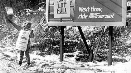 PAT driver Cindy Hoston of West Mifflin displays the colors to passersby on Lebanon Road in 1992.