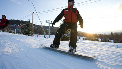 A member of the Ski Patrol cruises down Blue Mountain near Bethlehem, Pa.