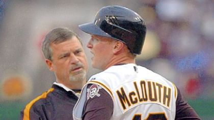 Pirate trainer Brad Henderson checks Nate McLouth after he was hit by a pitch in a 2006 game.