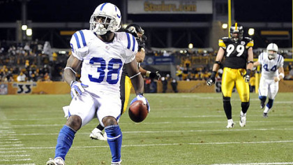 The Colts' Dominic Rhodes walks into the end zone for the winning touchdown in the fourth quarter.