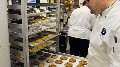 Big snack? Chef Hayes looks over fresh cookies at the cafeteria.