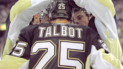 Maxime Talbot is congratulated after his third-period goal Thursday against the Hurricanes at Mellon Arena.