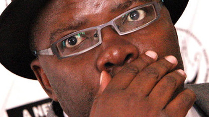 HARARE, Zimbabwe -- Opposition Movement for Democratic Change, Secretary General Tendai Biti, holds a news conference Dec. 15. The organization accused President Robert Mugabe's government of planning a state of emergency as an excuse to disregard rule of law.