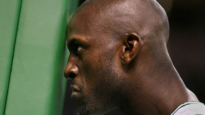 BOSTON -- Kevin Garnett, of the Boston Celtics, stairs at the back of the basketball goal standard, before tipoff against the Indiana Pacers, Dec.3, at TD Banknorth Garden.