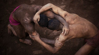 LAHORE, Pakistan -- Kushti wrestlers train at the Champion Akram Pahalwan Da Khara Wrestling Club in the Old City.