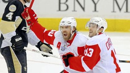 Henrik Zetterberg and Pavel Datsyuk celebrate Brian Rafalski's first-period goal against the Penguins in Game 6 of the Stanley Cup final June 4 at Mellon Arena. The Red Wings won the game and the Stanley Cup title.