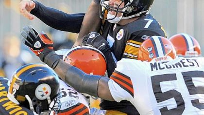 Ben Roethlisberger absorbs the Cleveland gang tackle led by Willie McGinest and D'Qwell Jackson that knocked him from the game.