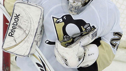 Goalie Marc-Andre Fleury makes a save against the New Jersey Devils in the first period of last night's game at Prudential Center in Newark, N.J.