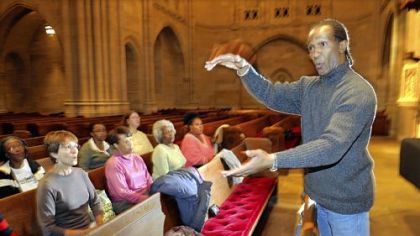 Herbert Jones directs a rehearsal of the Pittsburgh Gospel Choir, which will perform Saturday with the River City Brass Band in East Liberty Presbyterian Church.