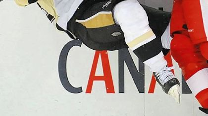 Ruslan Fedotenko collides with Detroit's Brad Stuart last night.